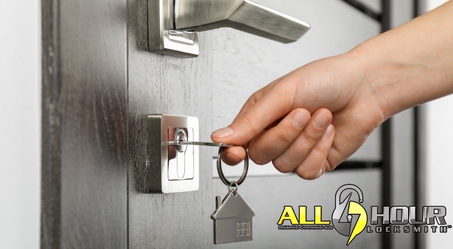 hand sliding key in door lock